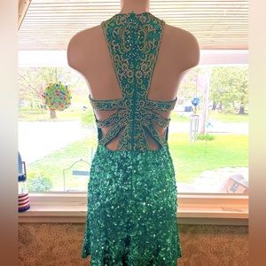 Sherri Hill. Size 6 Dress. All sequence with Cut Out Back.